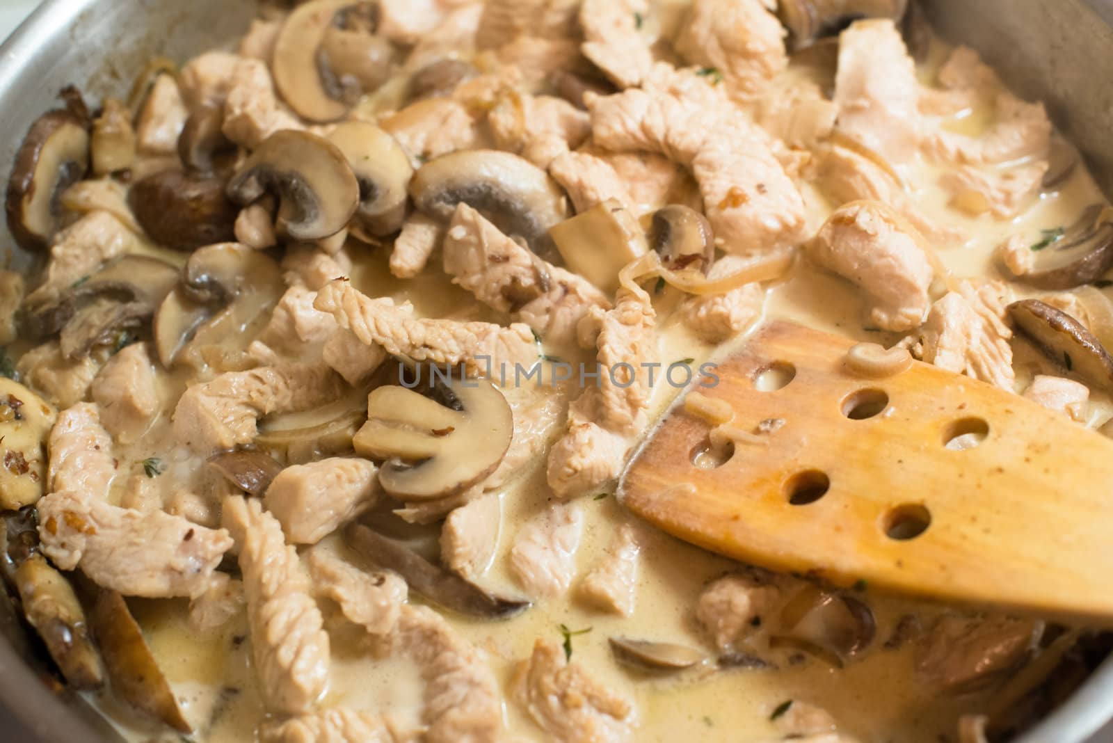 Zurich Ragout cooking in the pan with spatula