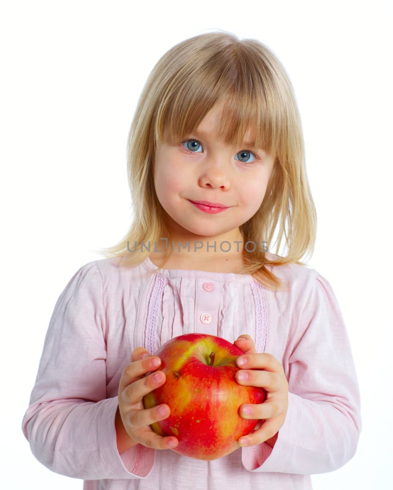 Little beauty girl holding big red apple. Isolated white background