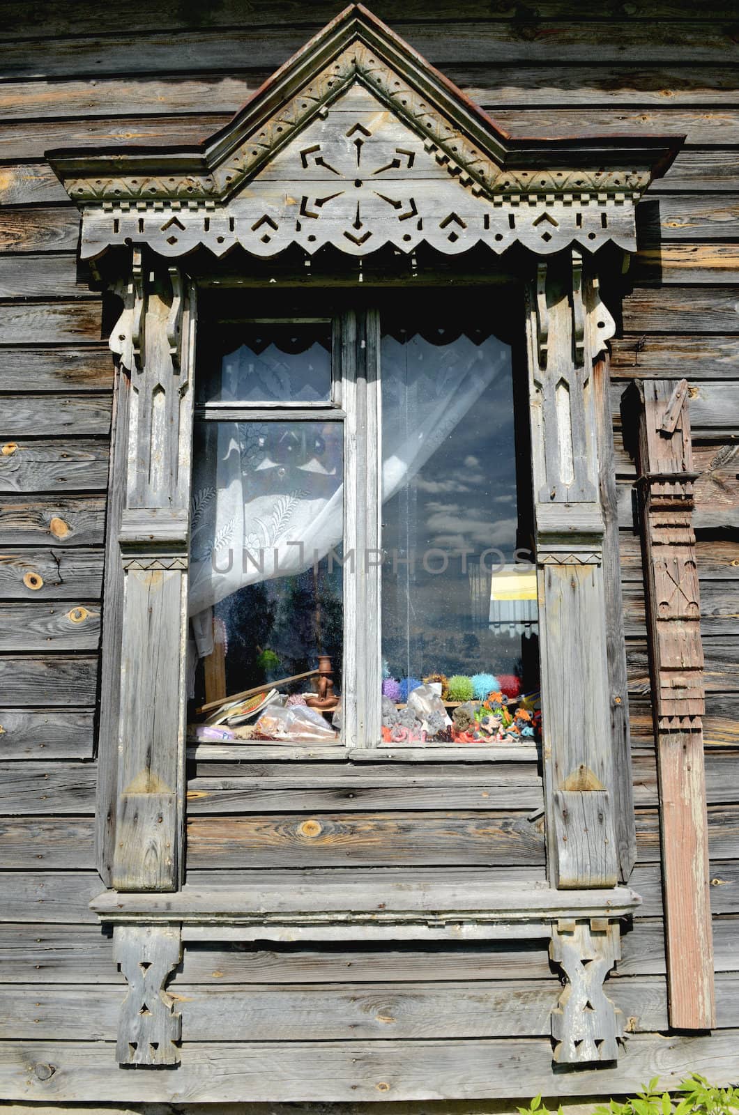 Traditional russian rural house  window platband. Taken on July 2012 Russia