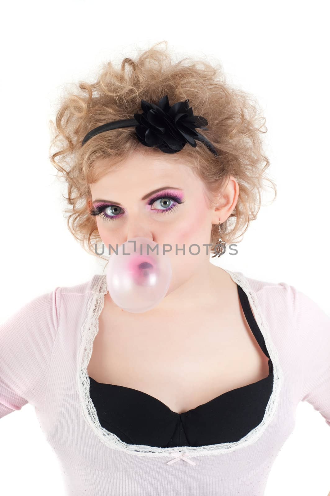 Portrait blonde with chewing gum and fancy make-up
