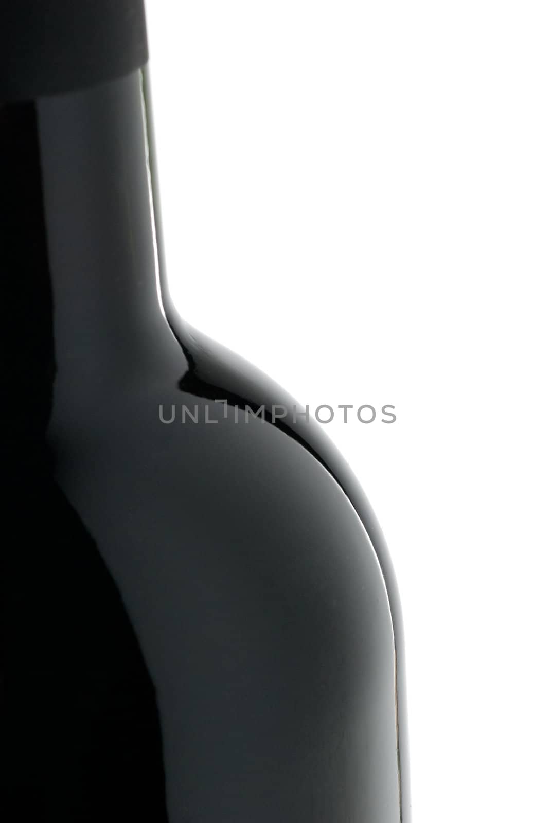 Profile shot of a black wine bottle on white