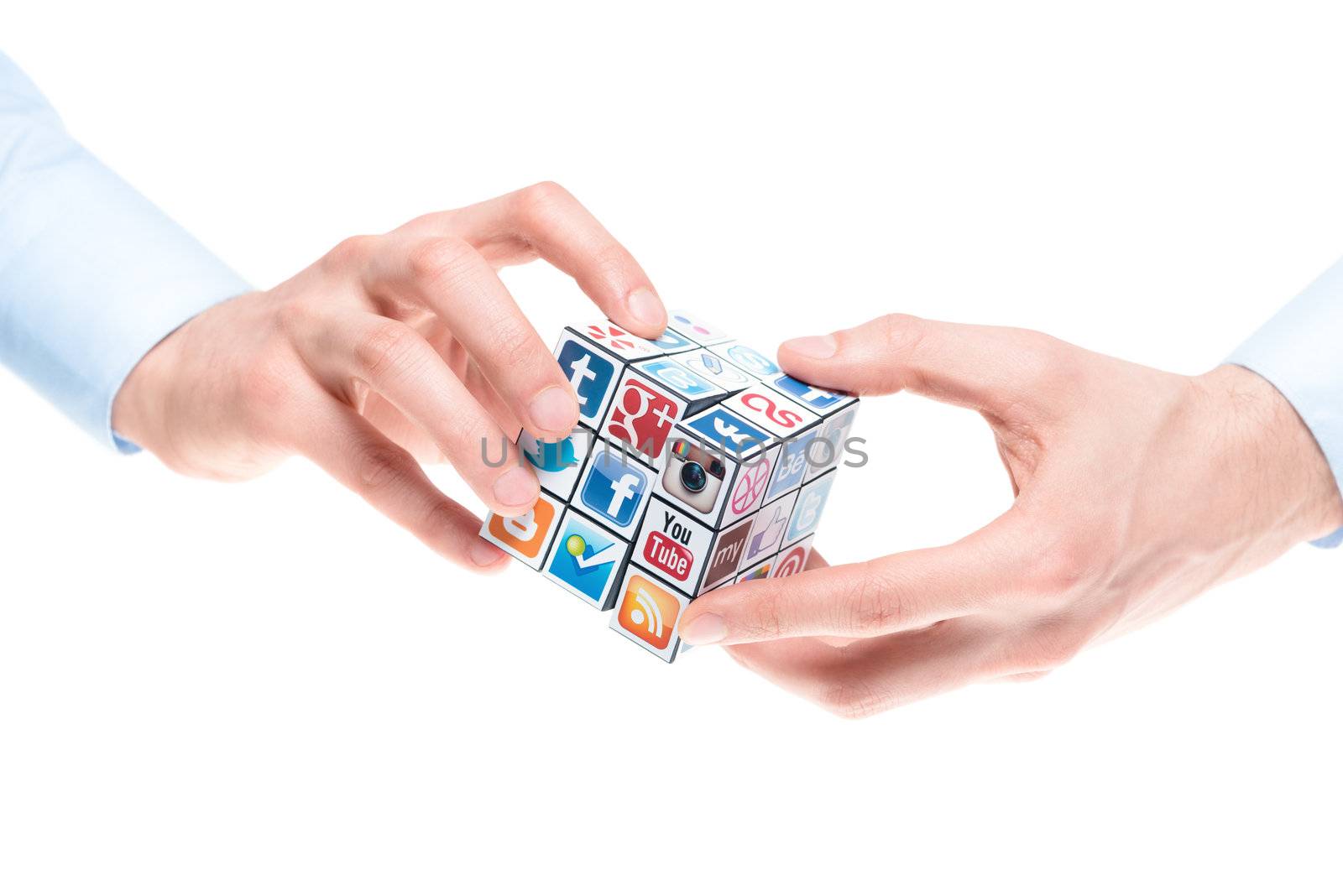 Kiev, Ukraine - February 2, 2013: A hands holding rubik's cube with logotypes of well-known social media brand's. Include Facebook, YouTube, Twitter, Google Plus, Instagram, Vimeo, Flickr, Myspace, Tumblr, Livejournal, Foursquare and other logos.