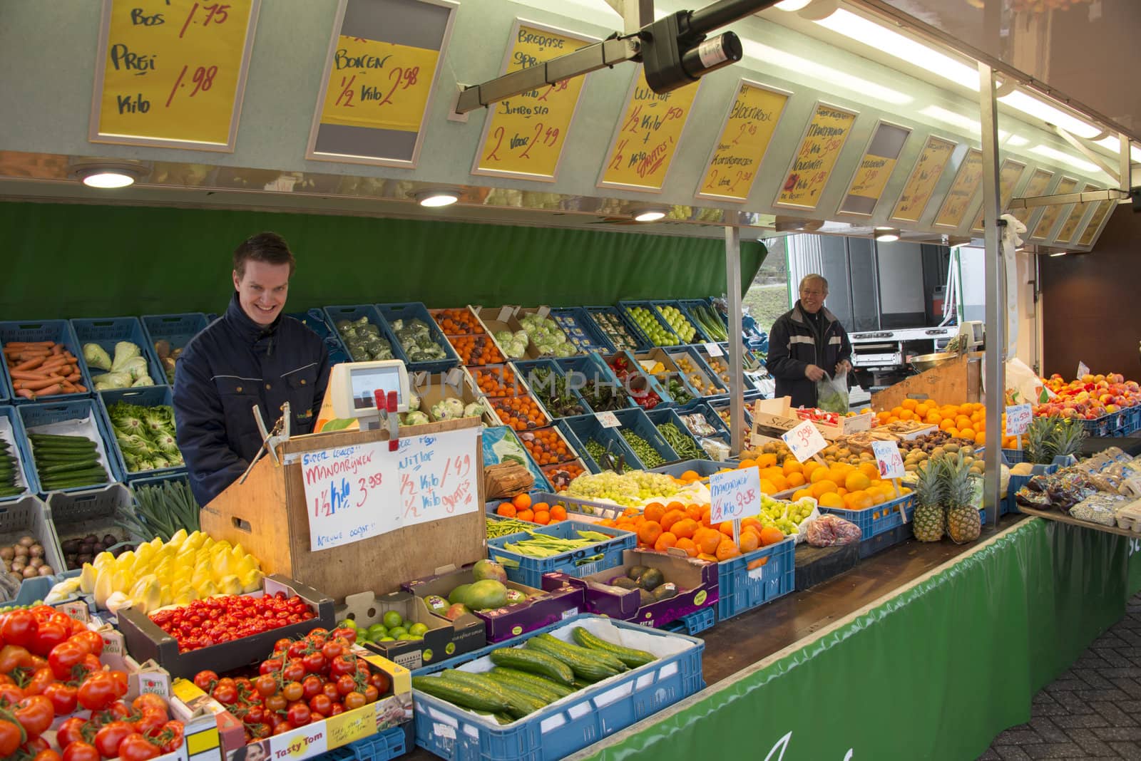 two mam with fruit stall on the market in Holland