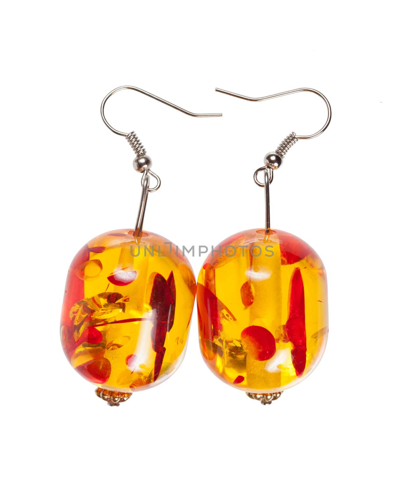 Earrings glass red-yellow color with an abstract pattern. Isolated on white background