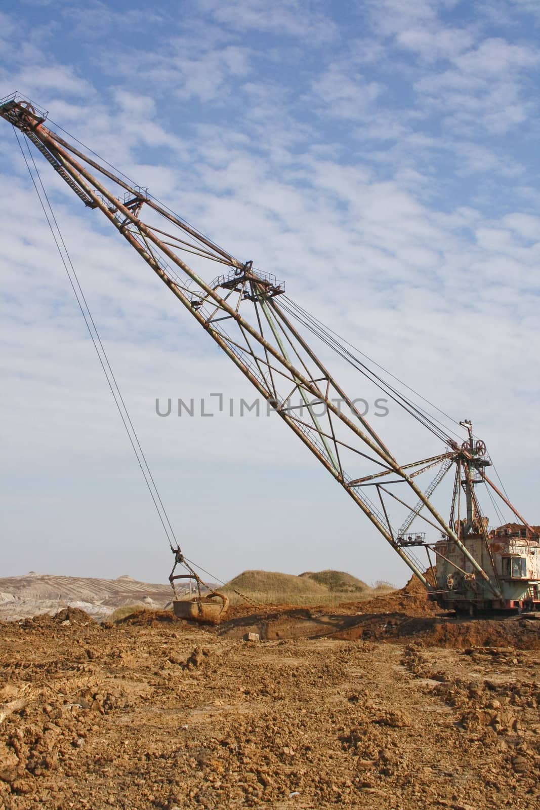 The industrial mechanism - a mountain dredge