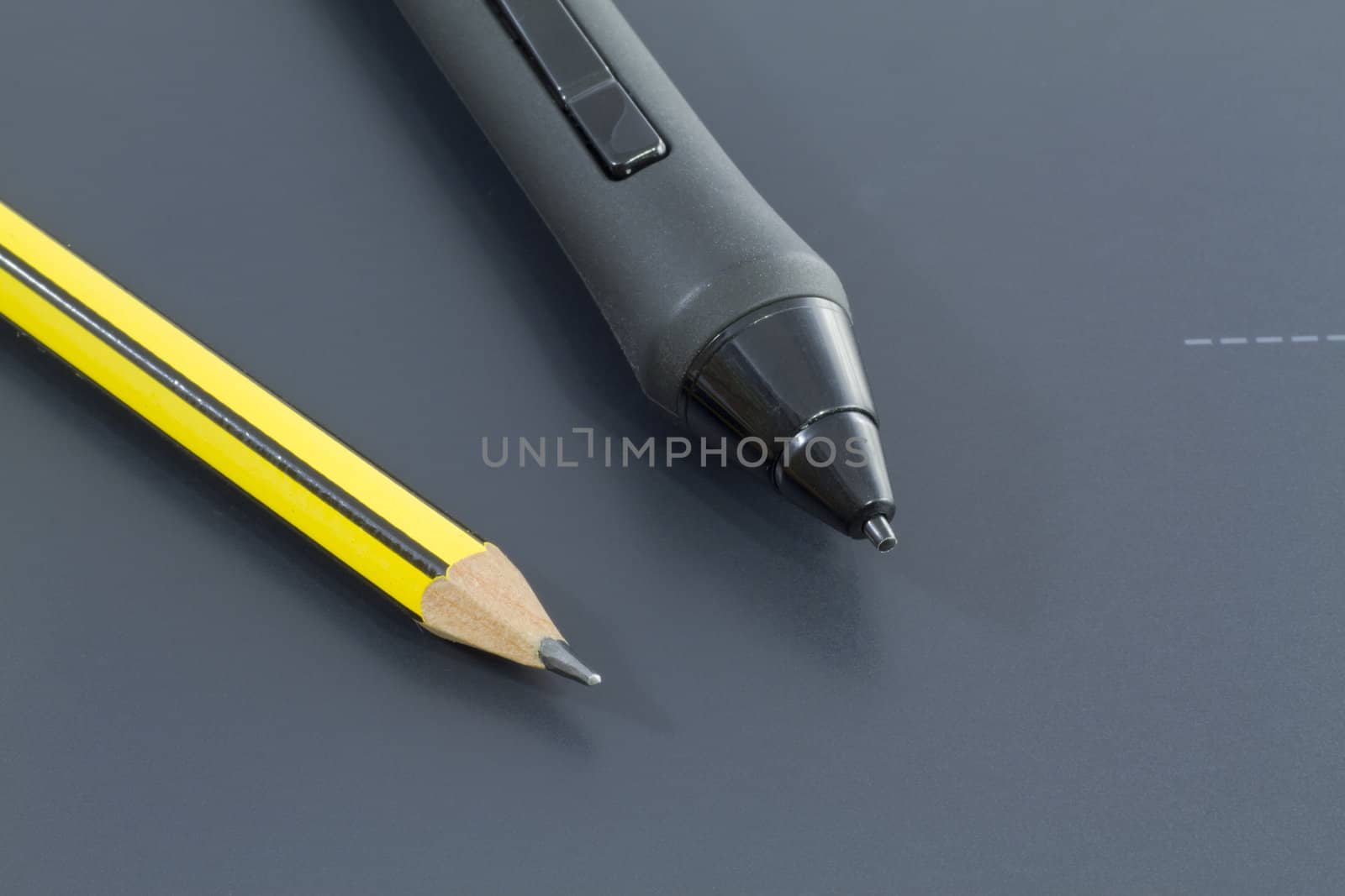 A Digital pencil sits side by side with its traditional cousin.