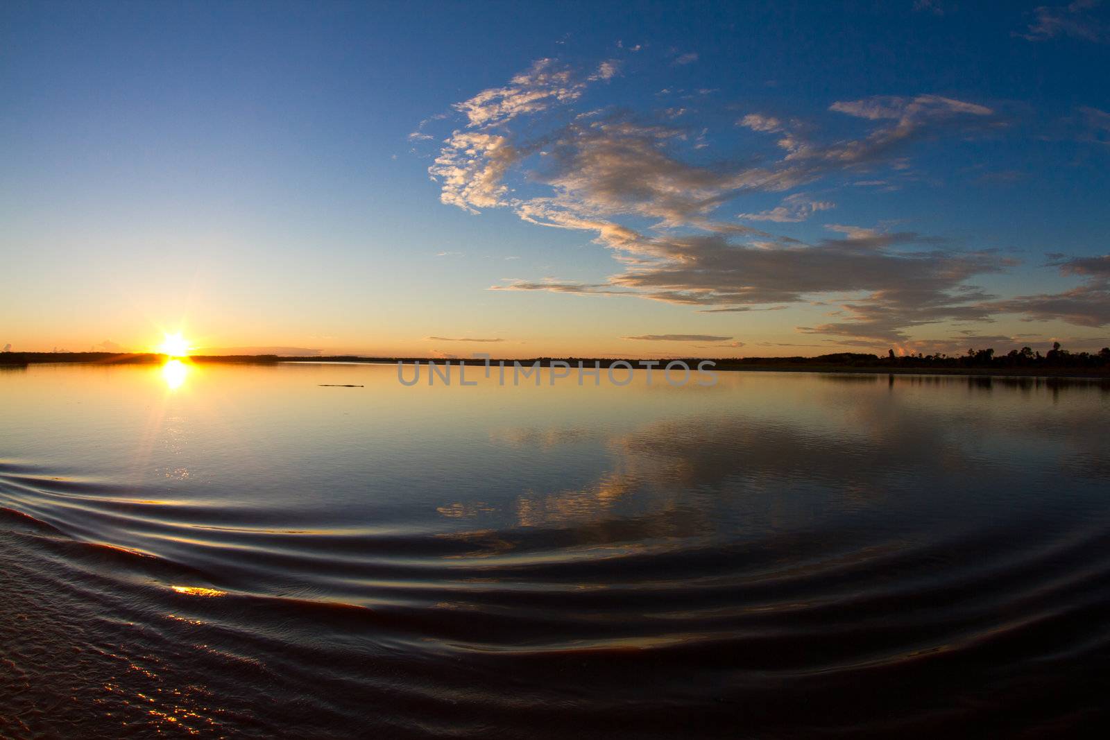 Sunrise on the Amazon river by MojoJojoFoto
