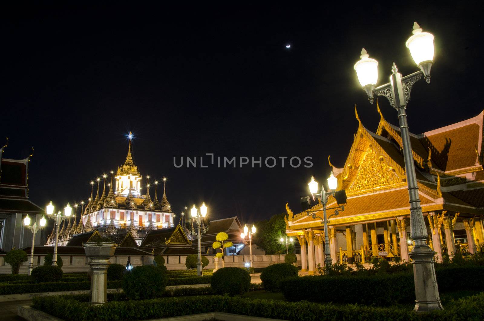 Lohaprasat in Wat Ratchanatdaram Worawihan, beautiful temple at night, Bangkok, Thailand