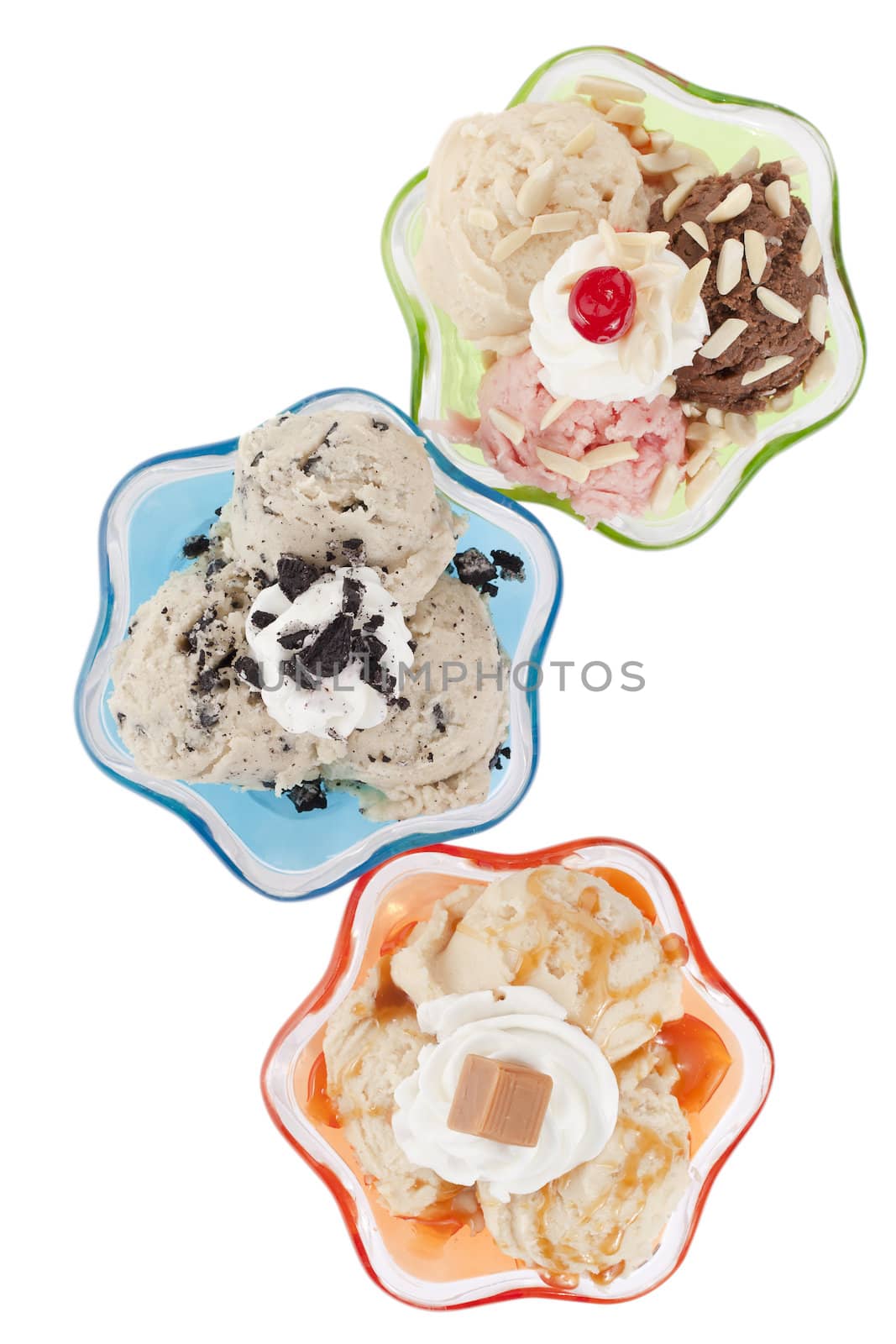 Assorted flavors of frozen yogurt with chocolate almond, vanilla, strawberry, cookies n&#x2019; cream and dulce de leche on a top view image