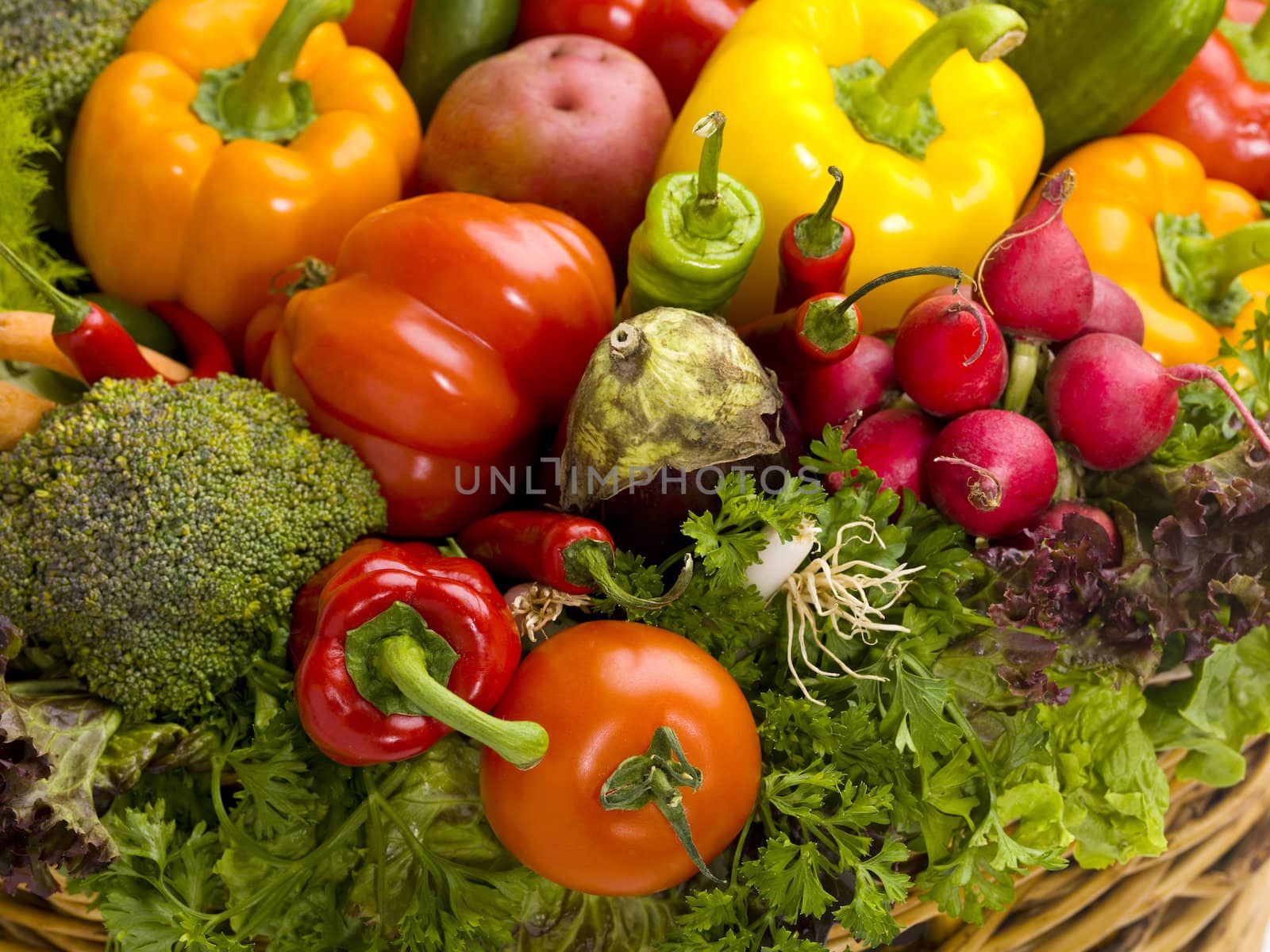 Close-up shot of a basket containing many vegetables.