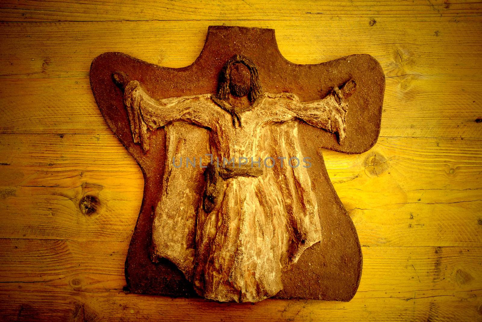 clay jesus card on wooden background