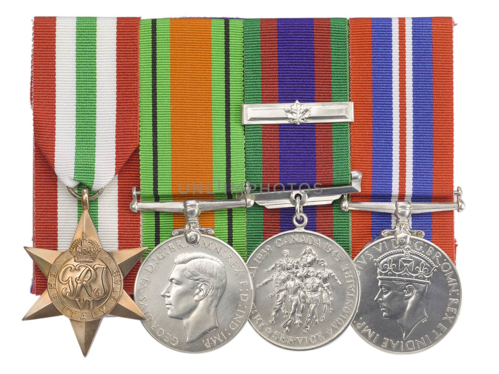 Macro image of four military medals in a row.
