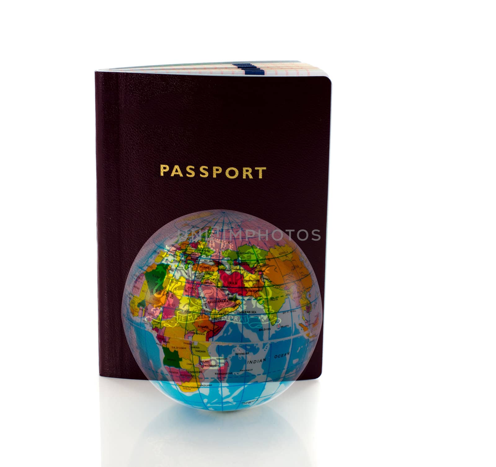 passport to travel around the world with world globe on foreground
