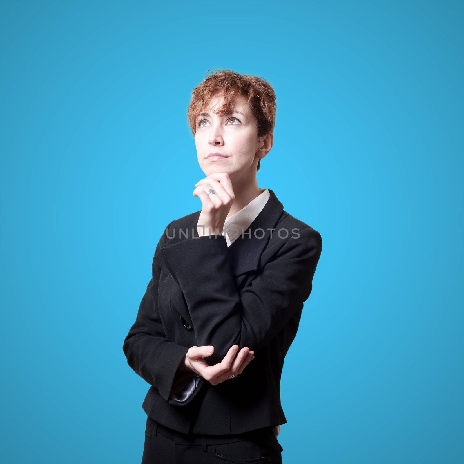thinking success short hair business woman on blue background