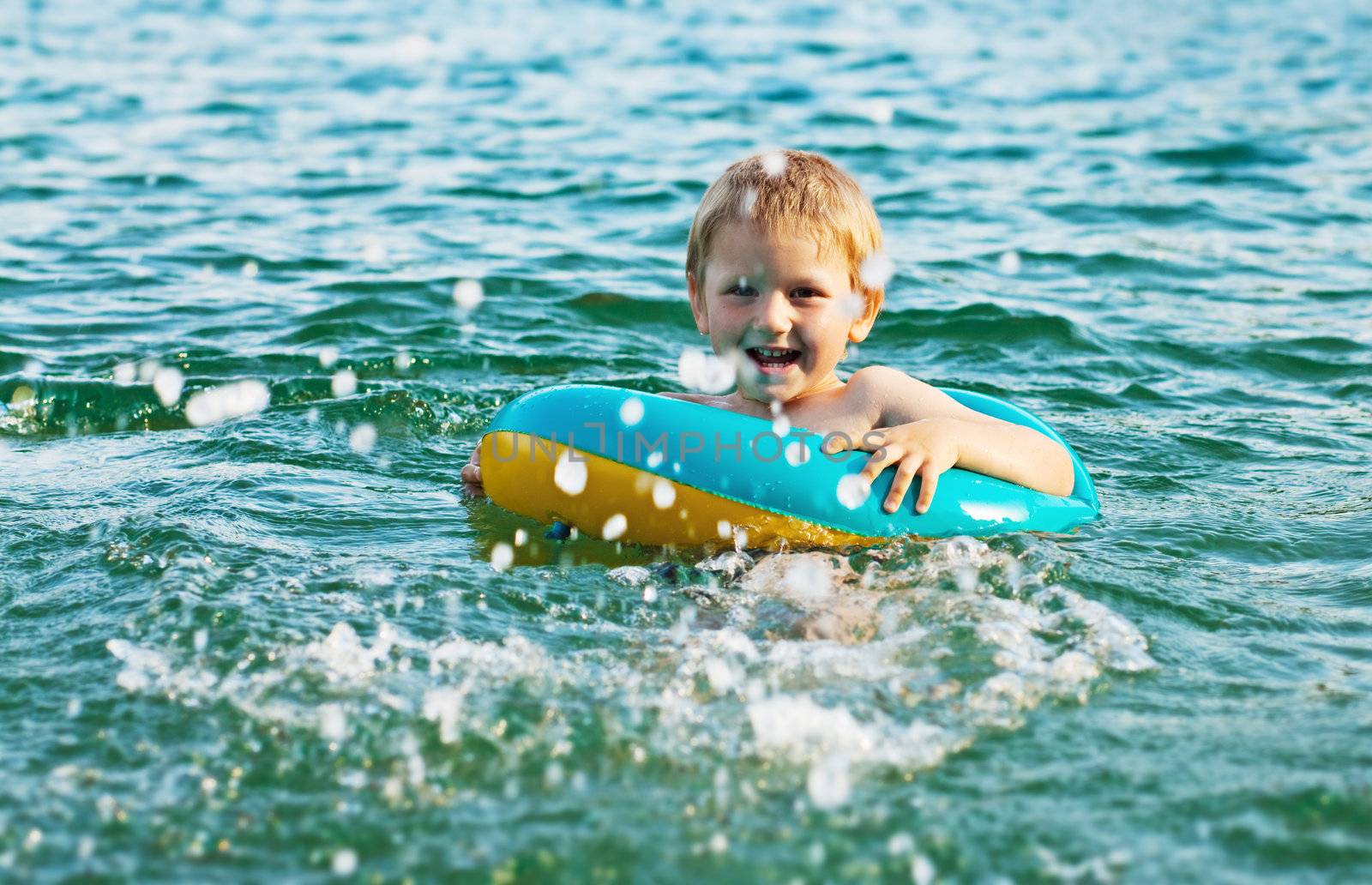 Little boy having fun in the water