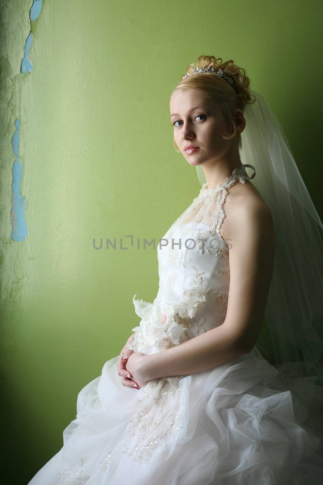 Beautiful bride in dress with flowers
