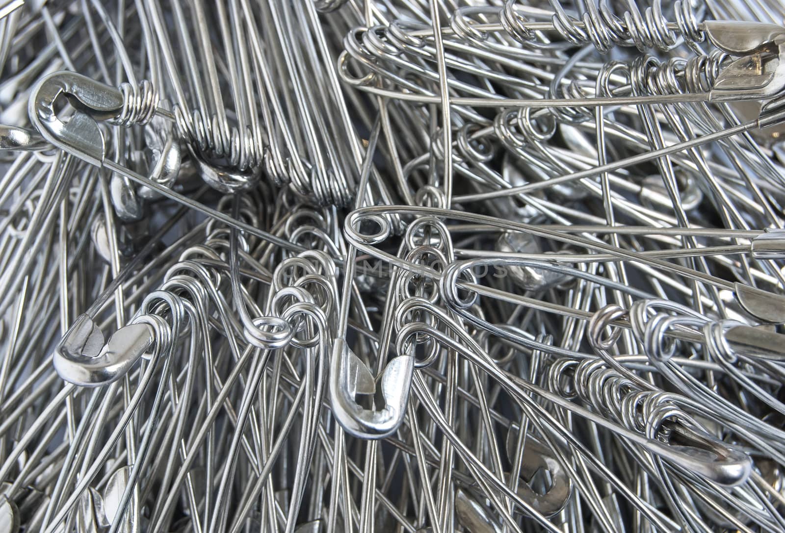 Silver colored big safety pins by varbenov