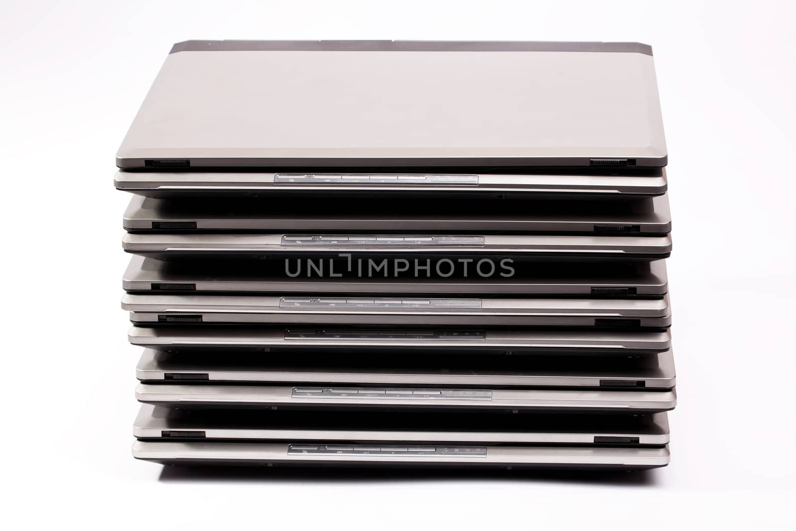 Organized pile of laptops by RawGroup