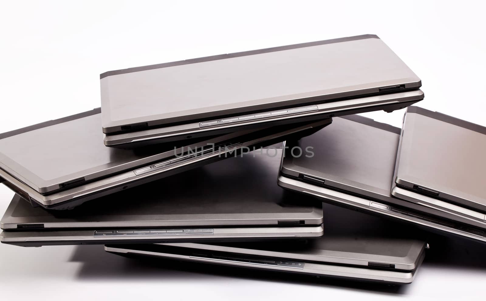 Pile of laptops by RawGroup