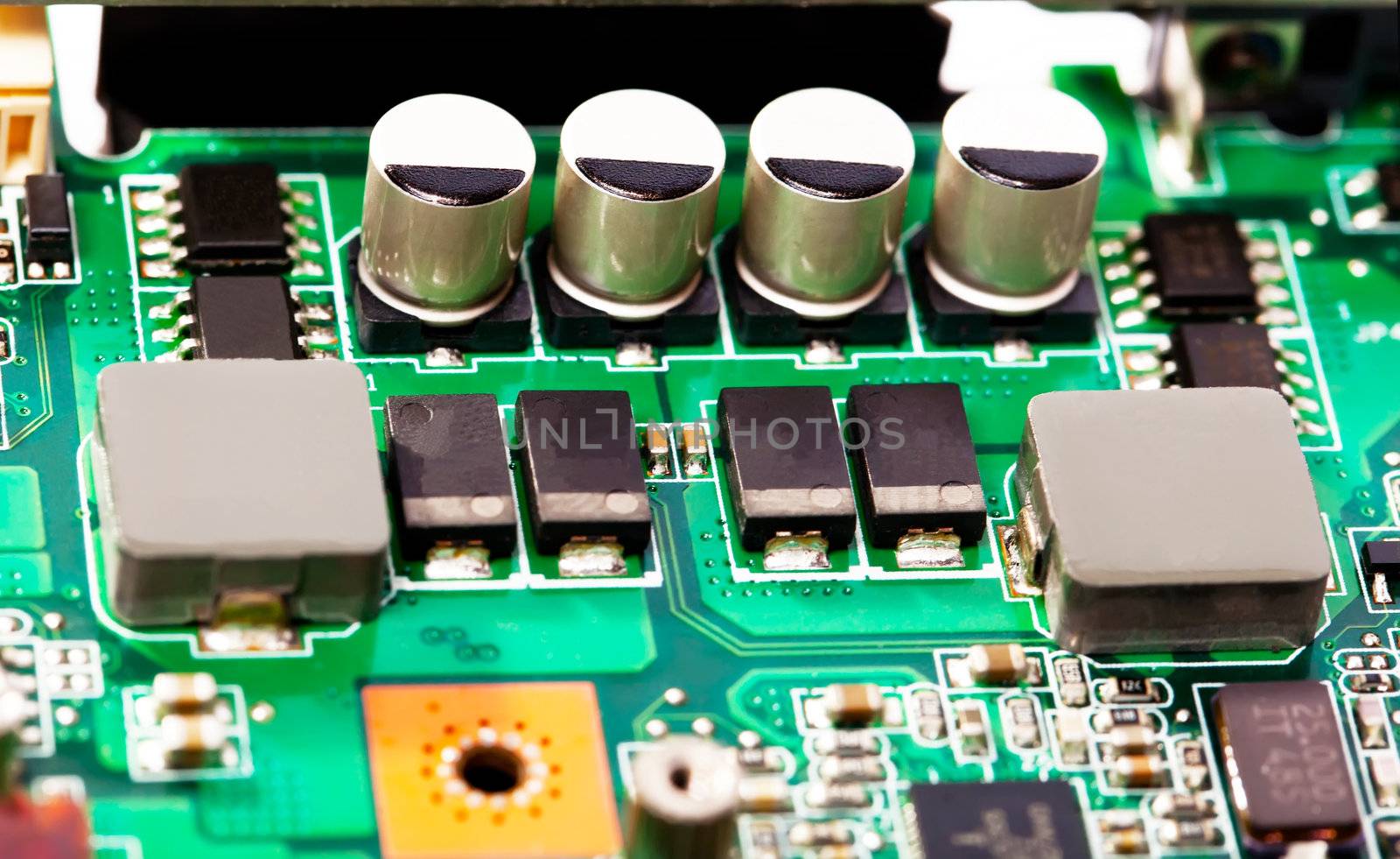 Condensator on green mother board by RawGroup