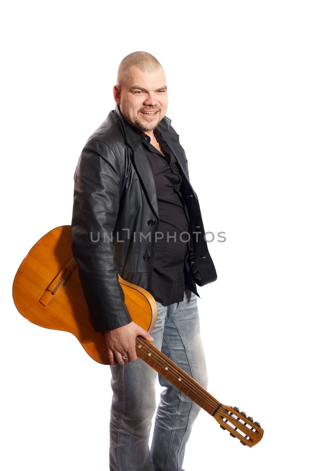 smiling man with a guitar on a white background