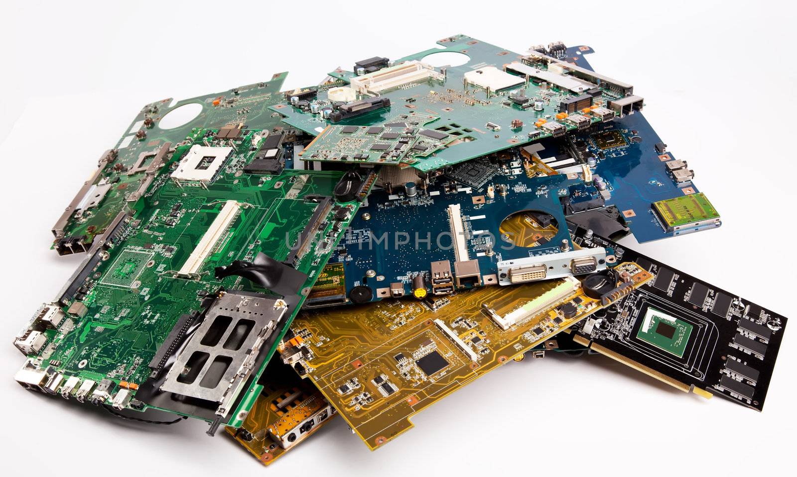 Pile of laptops mother boards by RawGroup