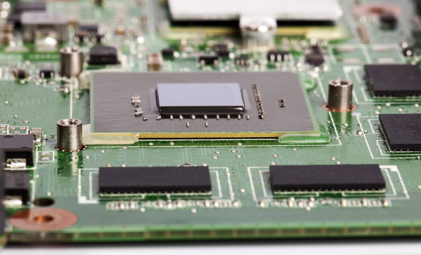Laptop video chip on green motherboard by RawGroup
