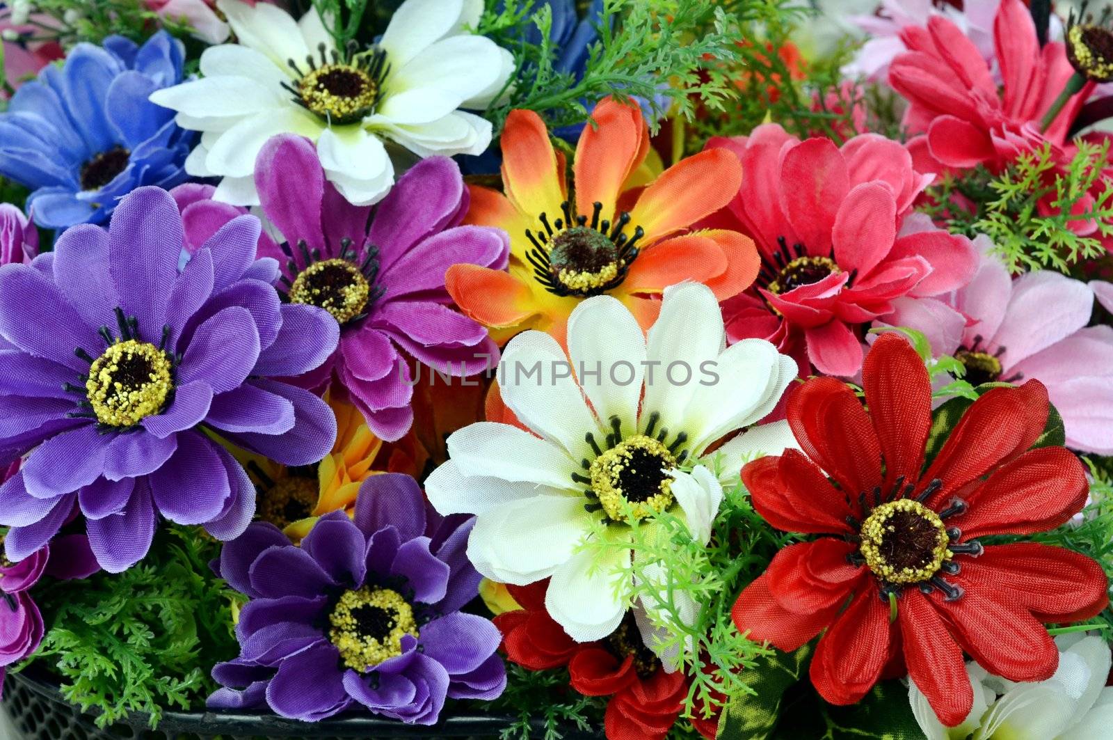 Bright and beautiful colors of plastic flowers.