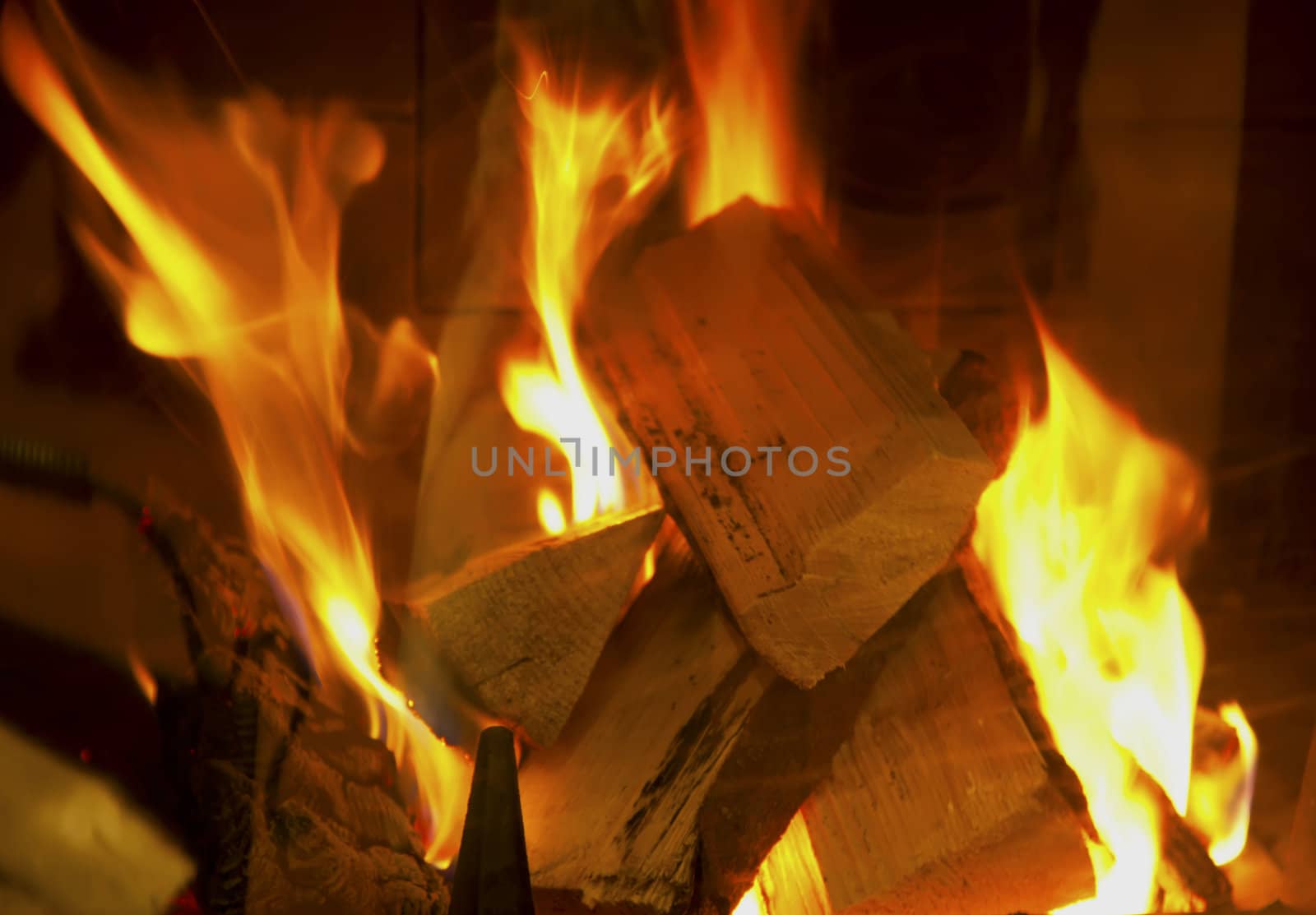 Fire in the fireplace by RawGroup
