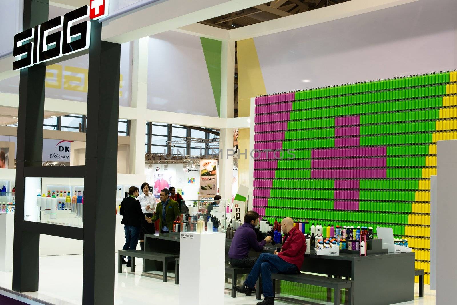FRANKFURT, GERMANY – FEBRUARY 16, 2013: Booth of Swiss company SIGG on the Ambiente trade fair on February 16, 2013 in Frankfurt, Germany. Ambiente is the biggest exhibition for consumer goods worldwide. The Sigg company was founded over 100 years ago and specializes in reusable aluminium water bottles, over 90% of them being exported worldwide.