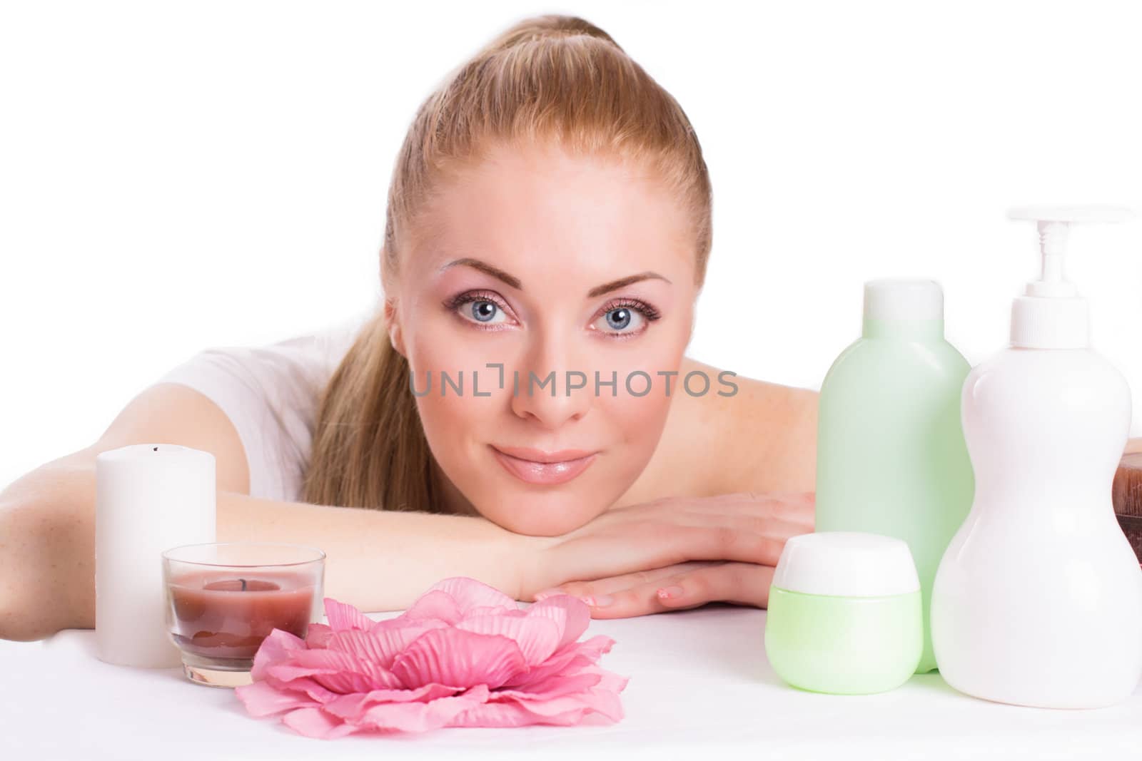 Beautiful woman face with skincare products by Angel_a