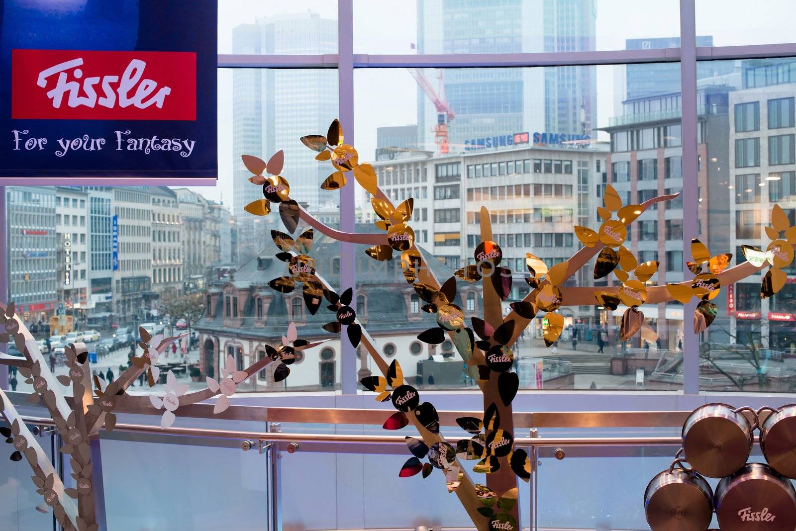 FRANKFURT, GERMANY – FEBRUARY 16, 2013: German kitchen accessories producer FISSLER is running a very creative shopping window campaign in Galeria Kaufhof store in Frankfurt´s famous shopping mile Zeil ) in downtown Frankfurt am Main, Germany on February 16, 2013. This activity is accompanying the Amiente trade fair, the biggest exhibition for consumer goods worldwide.