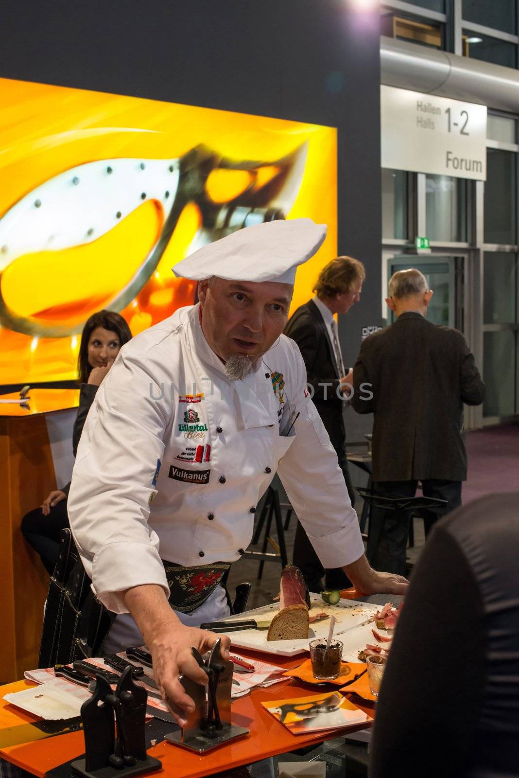 FRANKFURT, GERMANY – FEBRUARY 16, 2013: Booth of Swiss Company Nouvel on the Ambiente trade fair on February 16, 2013 in Frankfurt, Germany. Ambiente is the biggest exhibition for consumer goods worldwide. Nouvel is a Swiss company producing table cooking products, mainly the famous Swiss fondue sets.