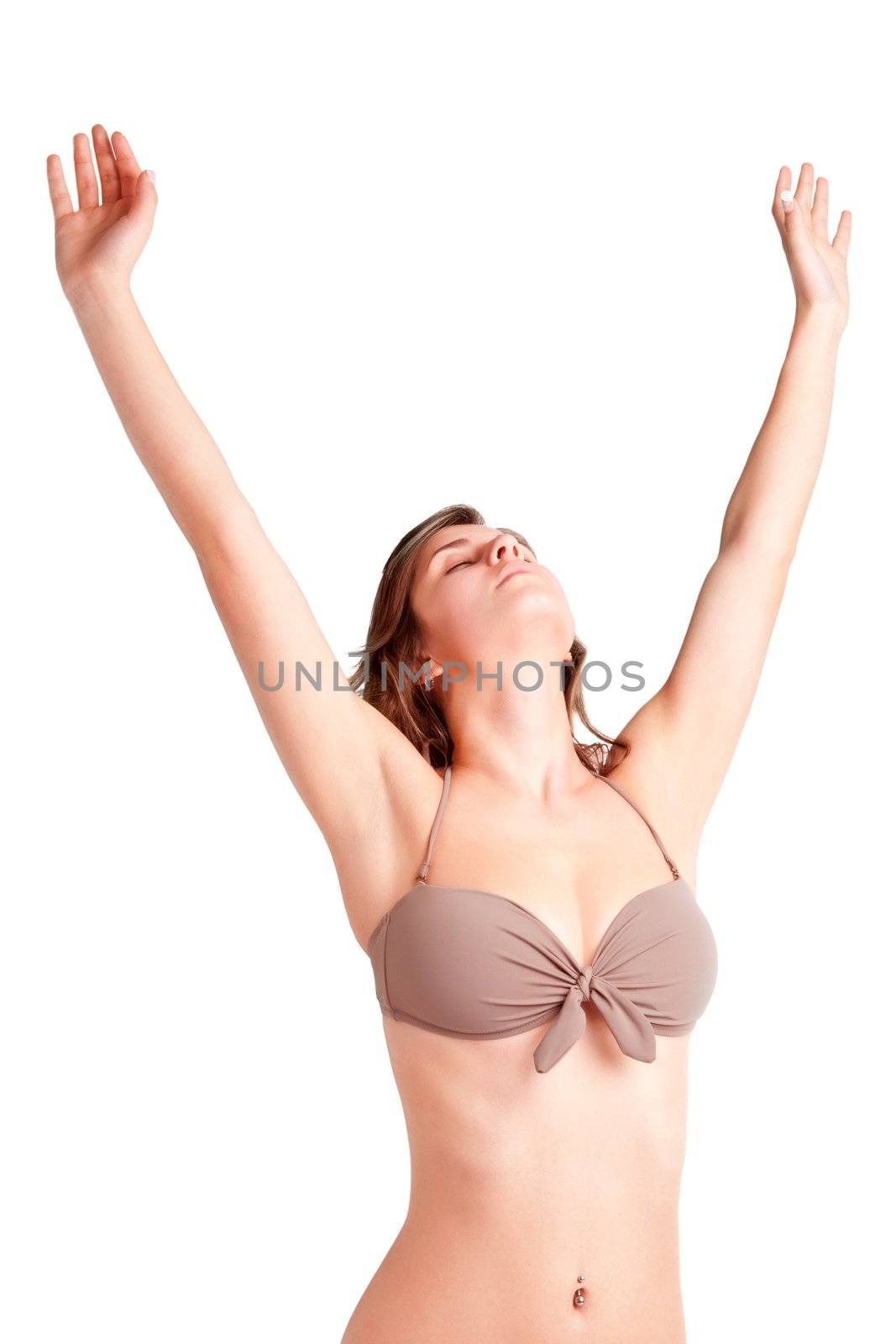 Woman stretching, wearing a bikini, isolated in a white background
