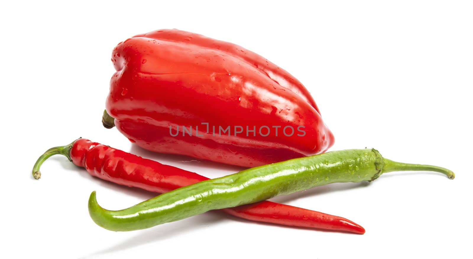Autumn red and green pepper isolated on white by RawGroup