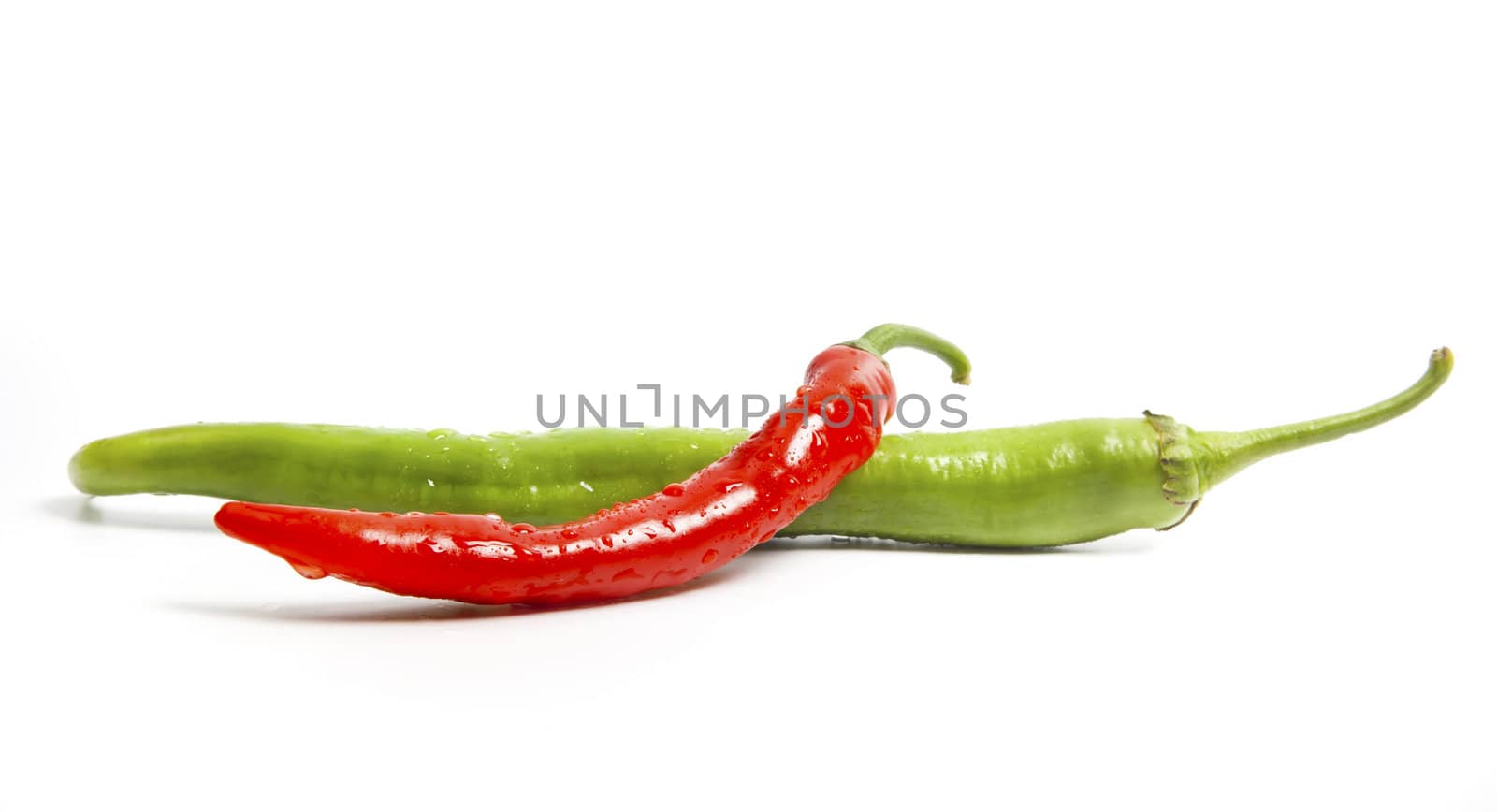 Chili peppers composition isolated on white by RawGroup