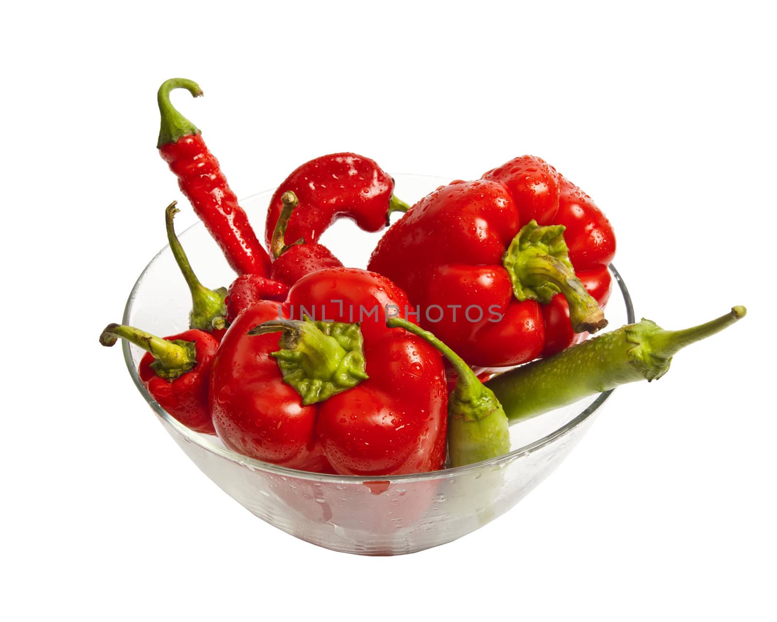 Glass dish full of red and green pepper by RawGroup