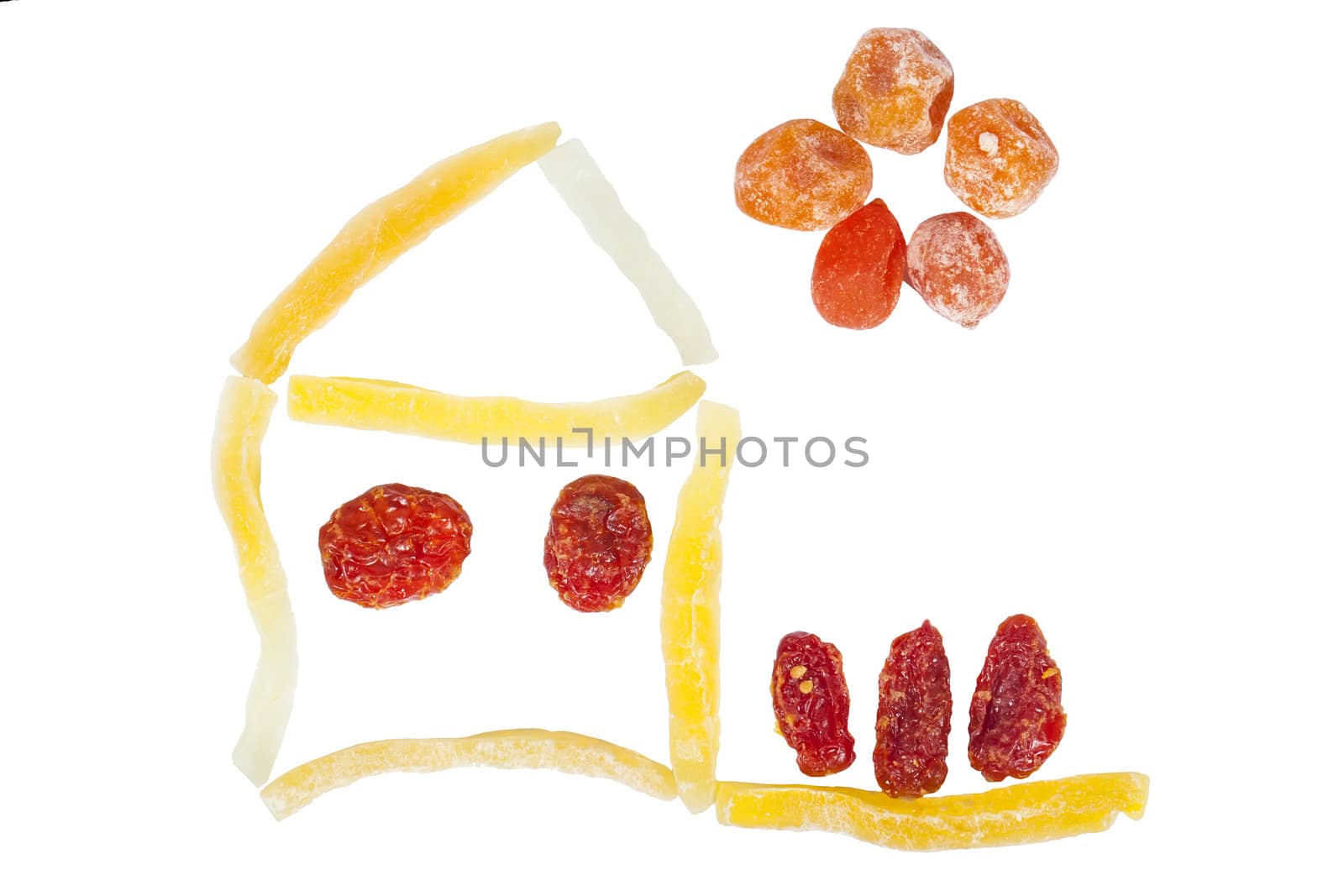 House figure made with dried fruits isolated on white