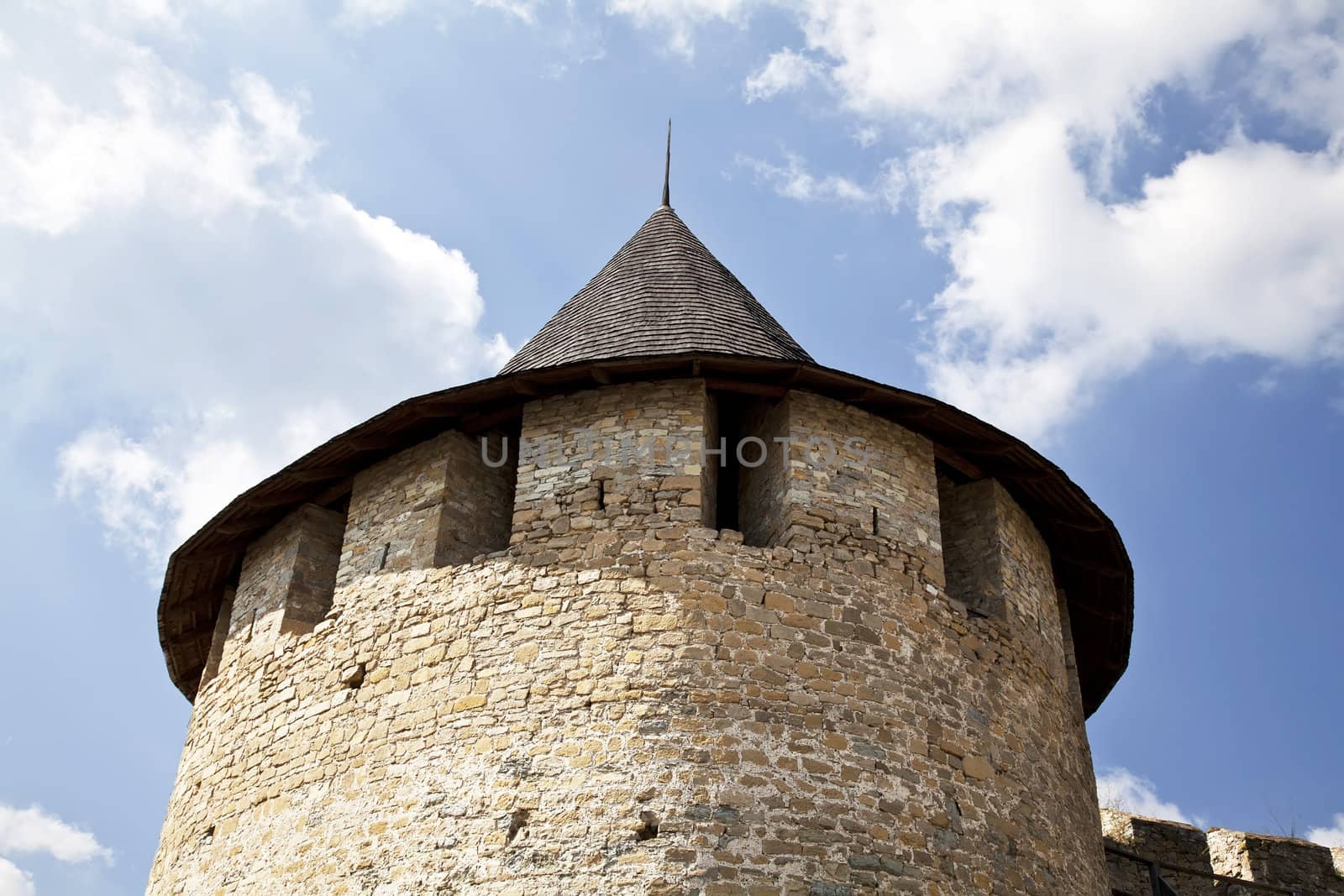 Hotin castle tower with ruins in summer in ukraine