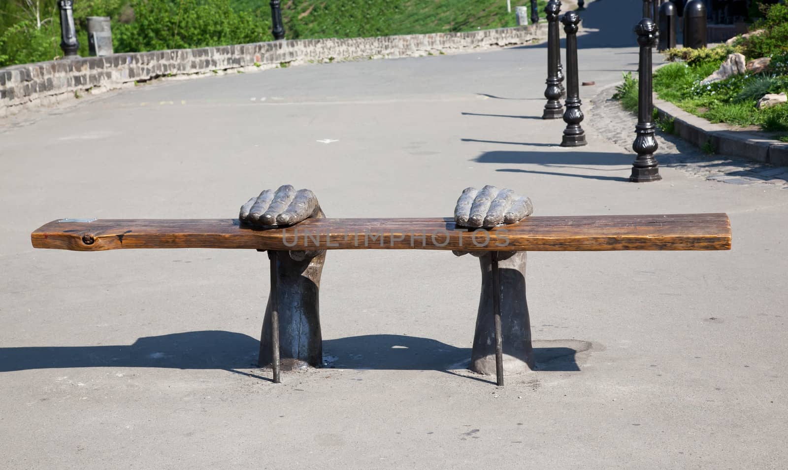 Bench with hands in park