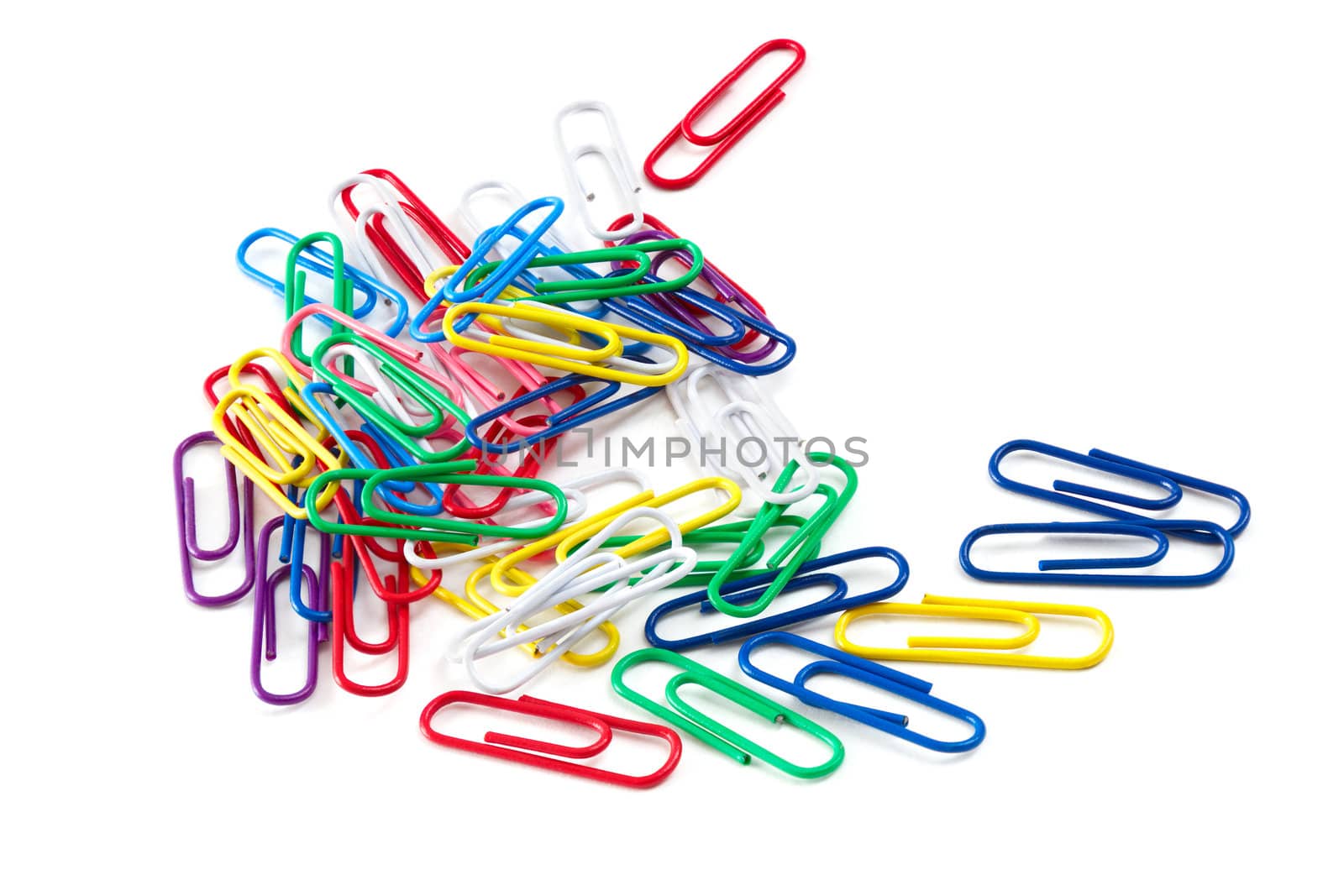 Colored paper clips on a white background