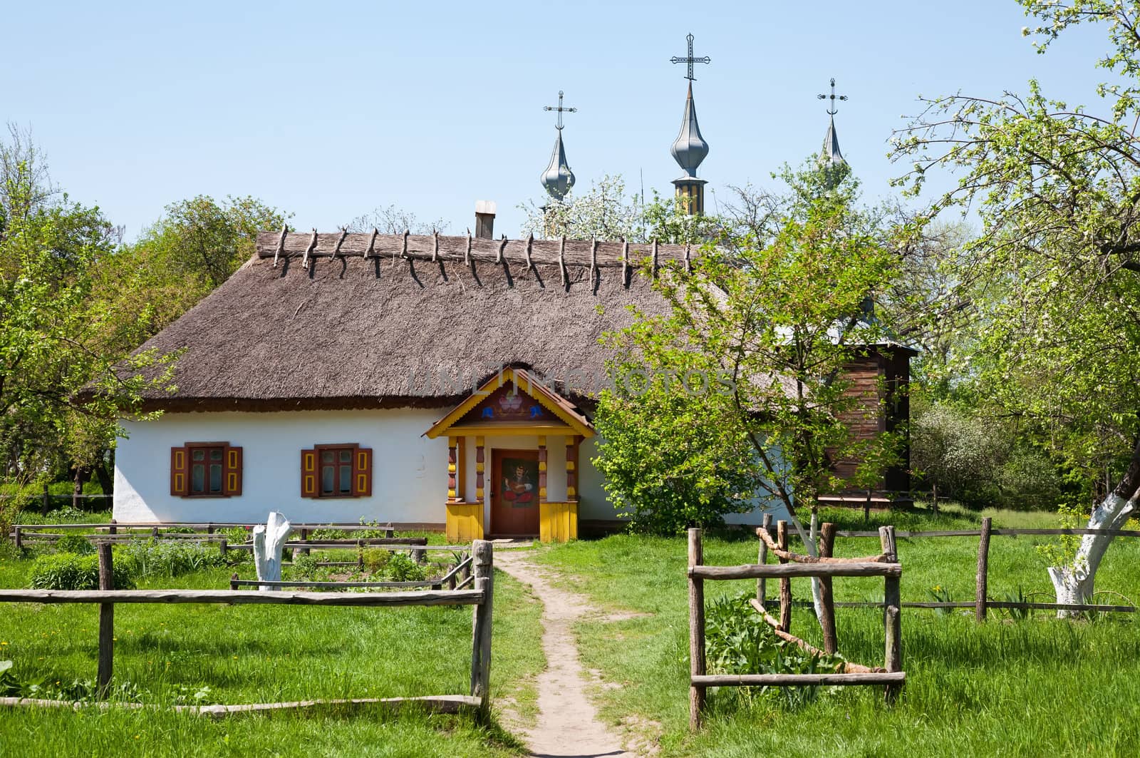 Ukrainian traditional hut with fence