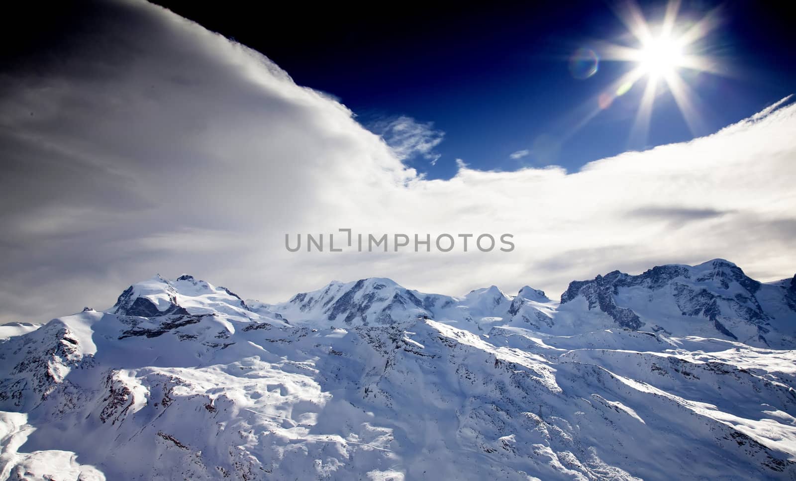 Sun on the top of the Matterhorn mountain by RawGroup