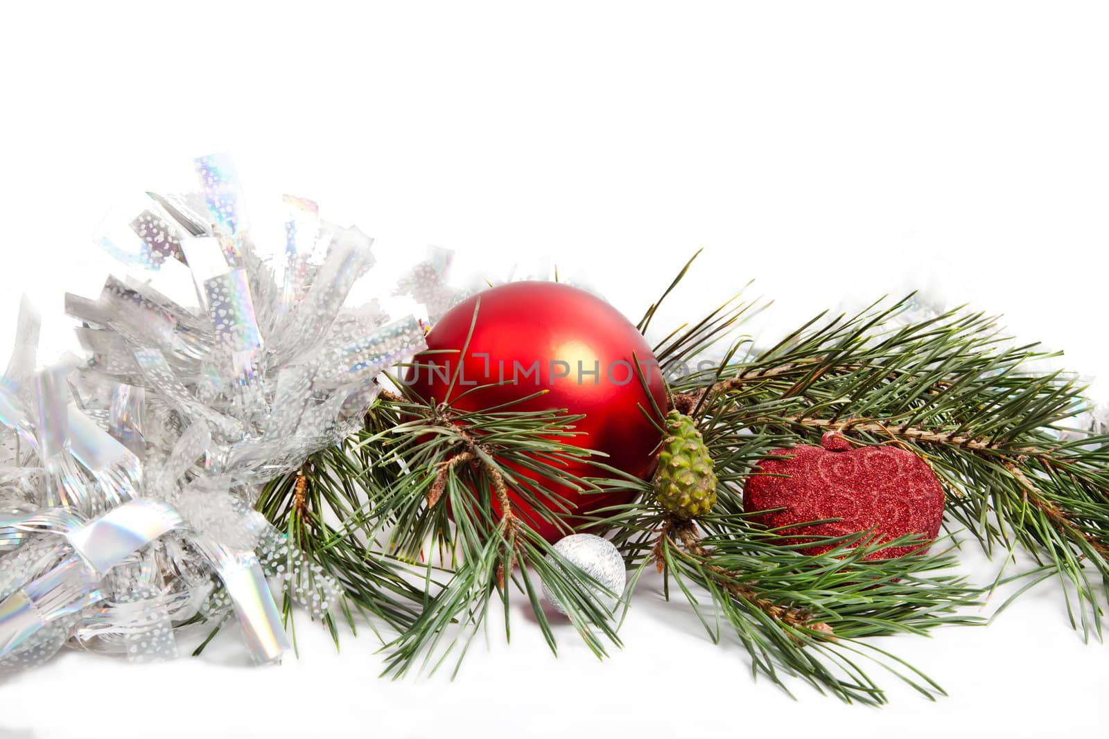 Christmas pine branch with decorations by RawGroup