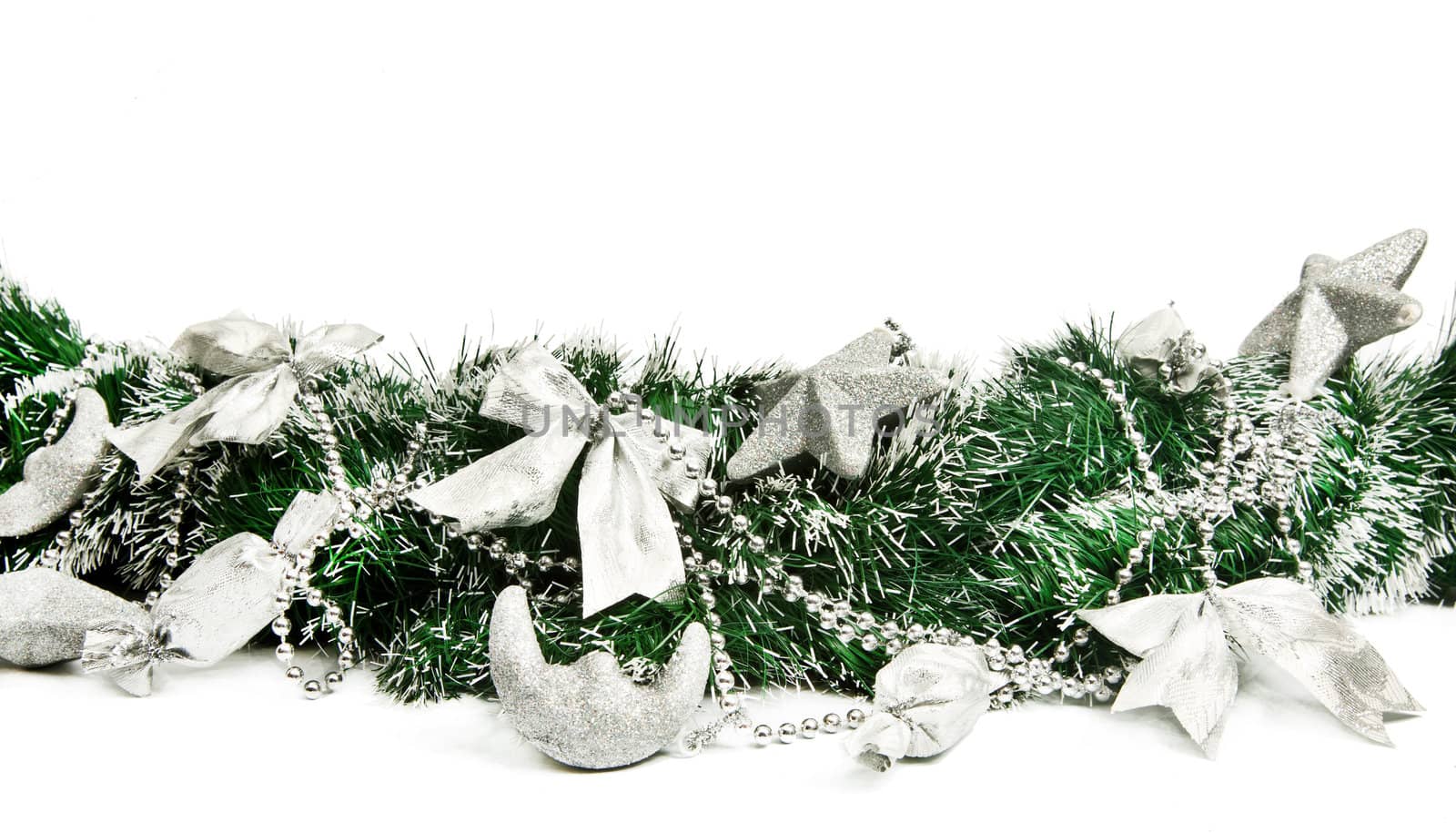 Part of Christmas wreath with decorations isolated on white