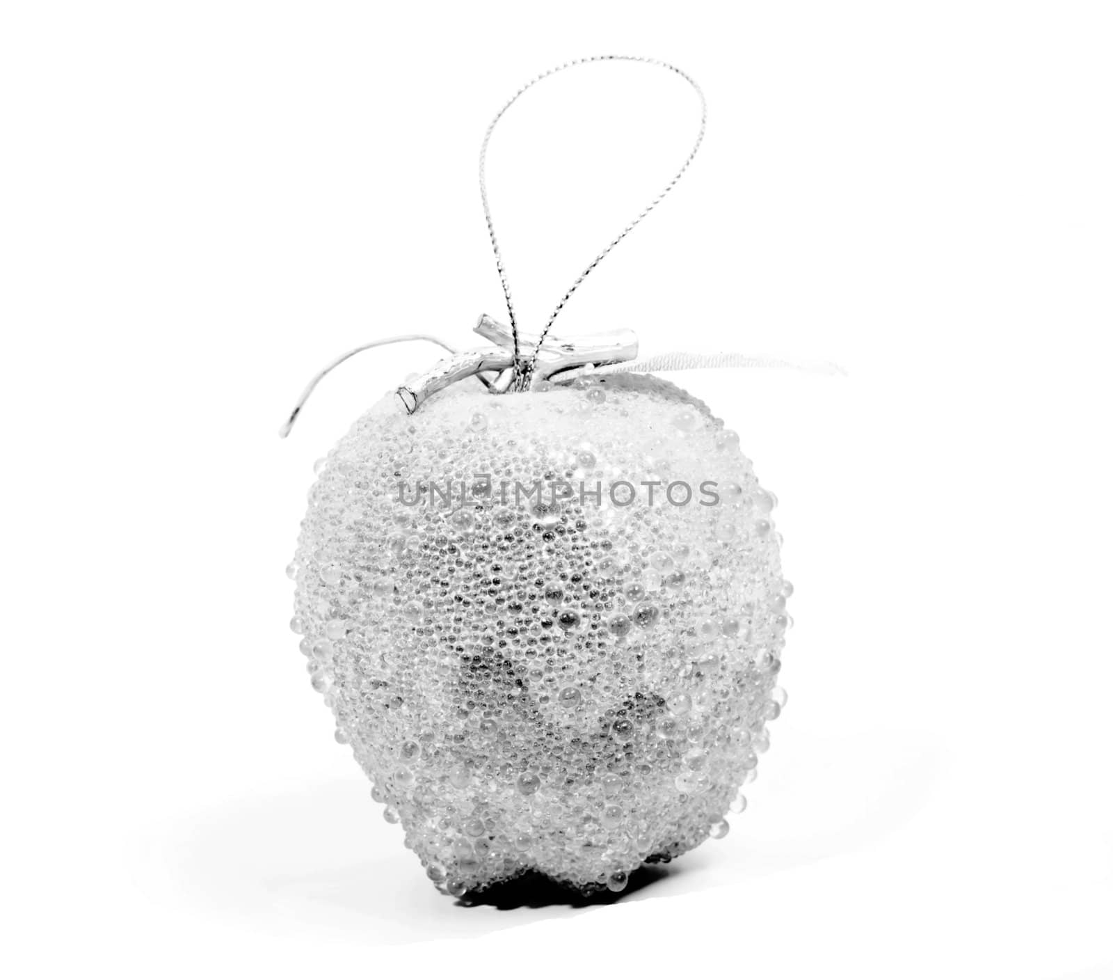 Silver apple decoration on white background