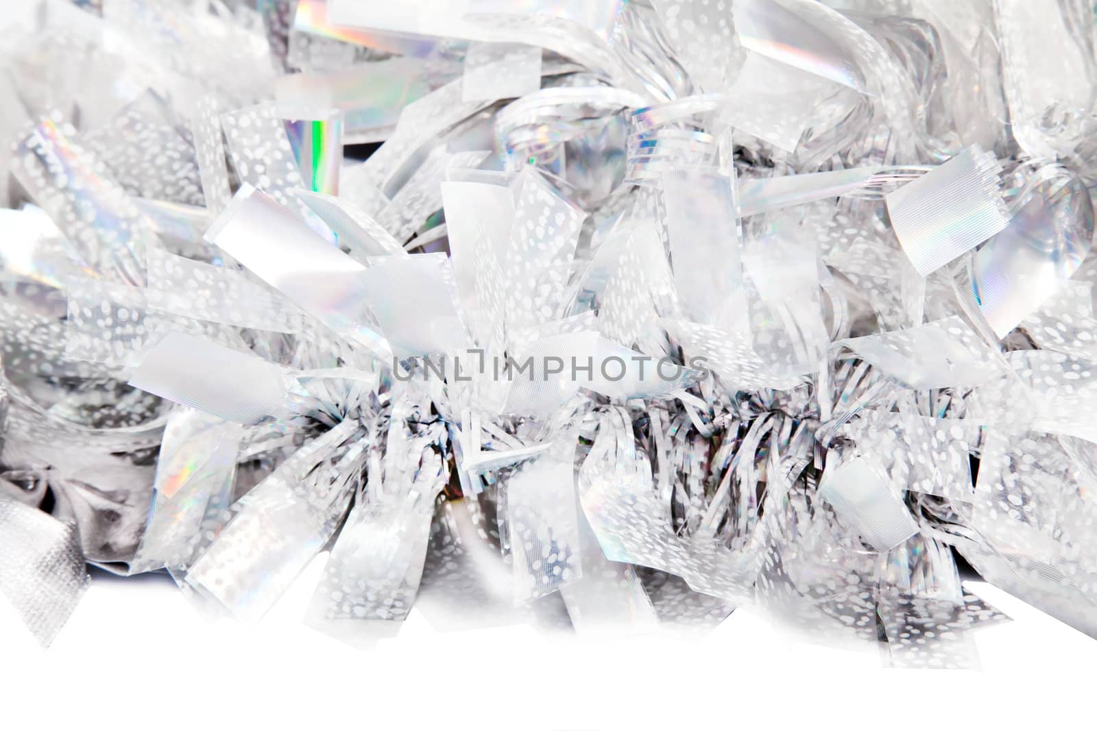 Sliver Christmas tinsel isolated on white