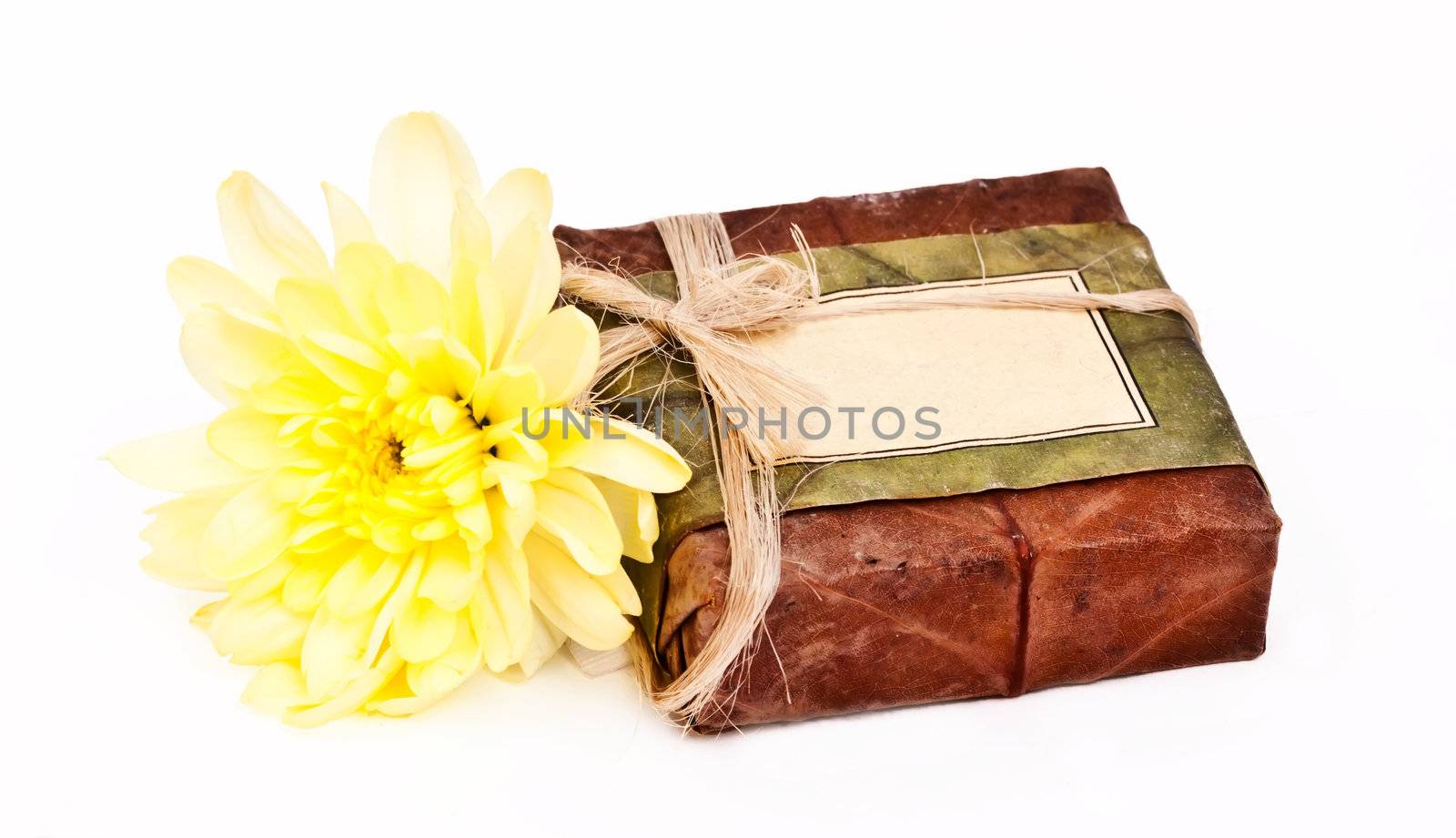 Briquette of Himaayan soap with yellow flower
