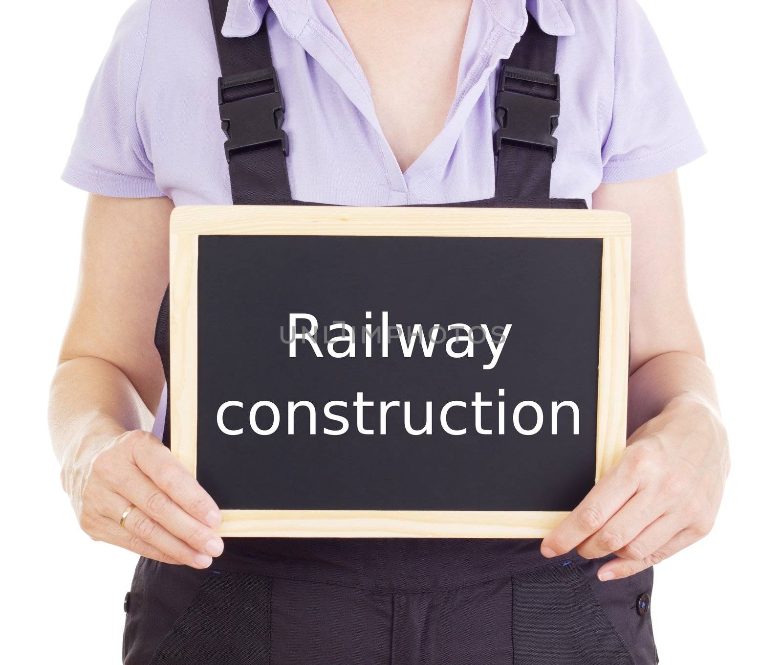 Craftsperson with blackboard: railway construction