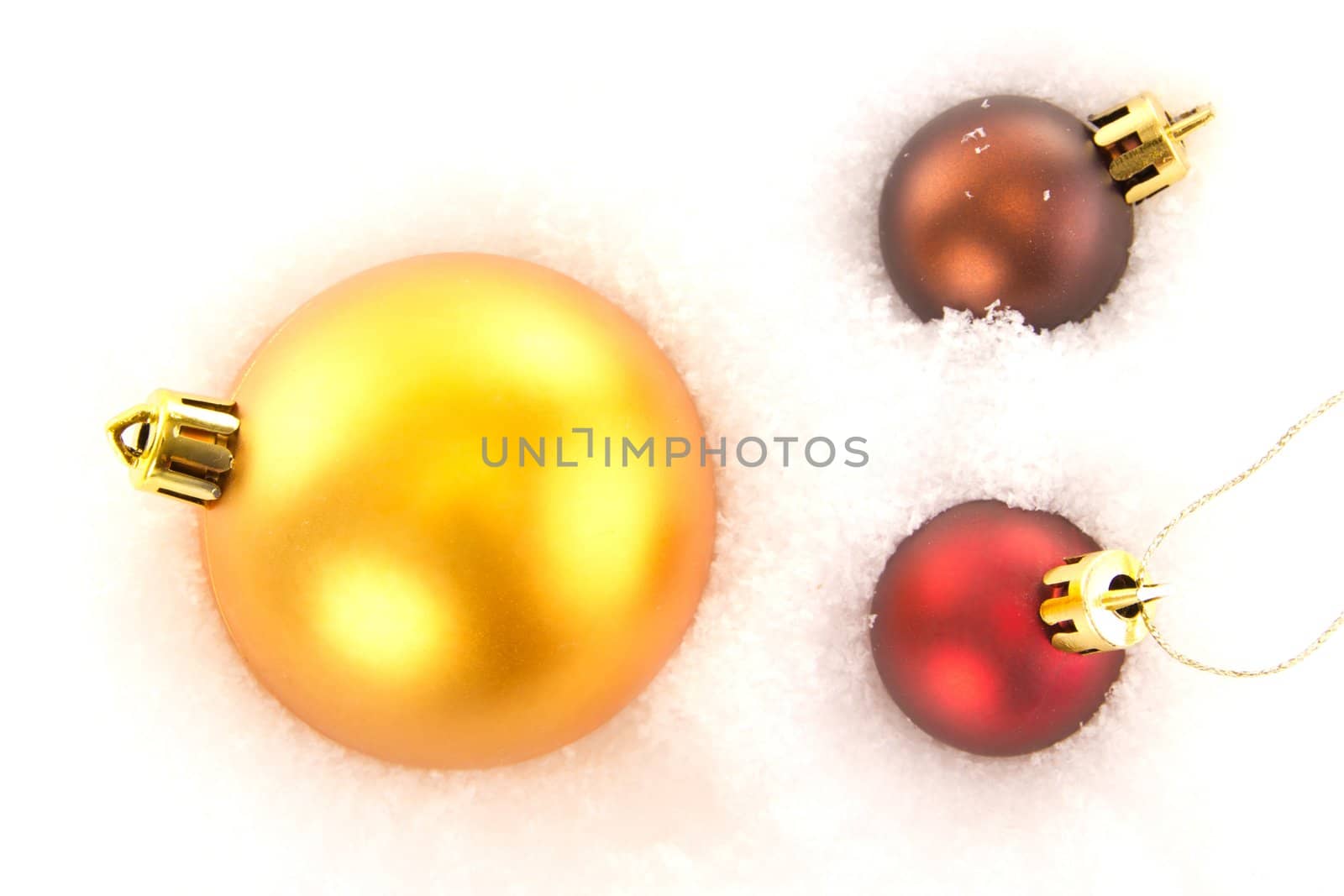 Christmas tree balls in snow